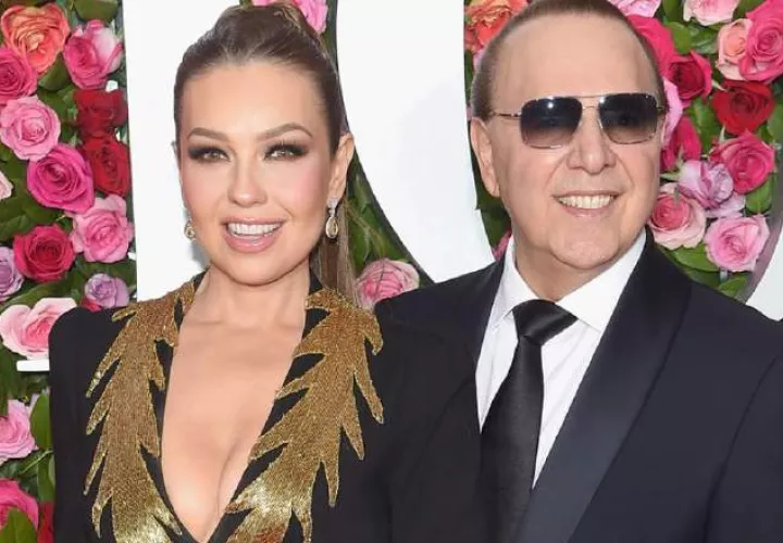 Thalía y su esposo, Tommy Mottola. AFP
